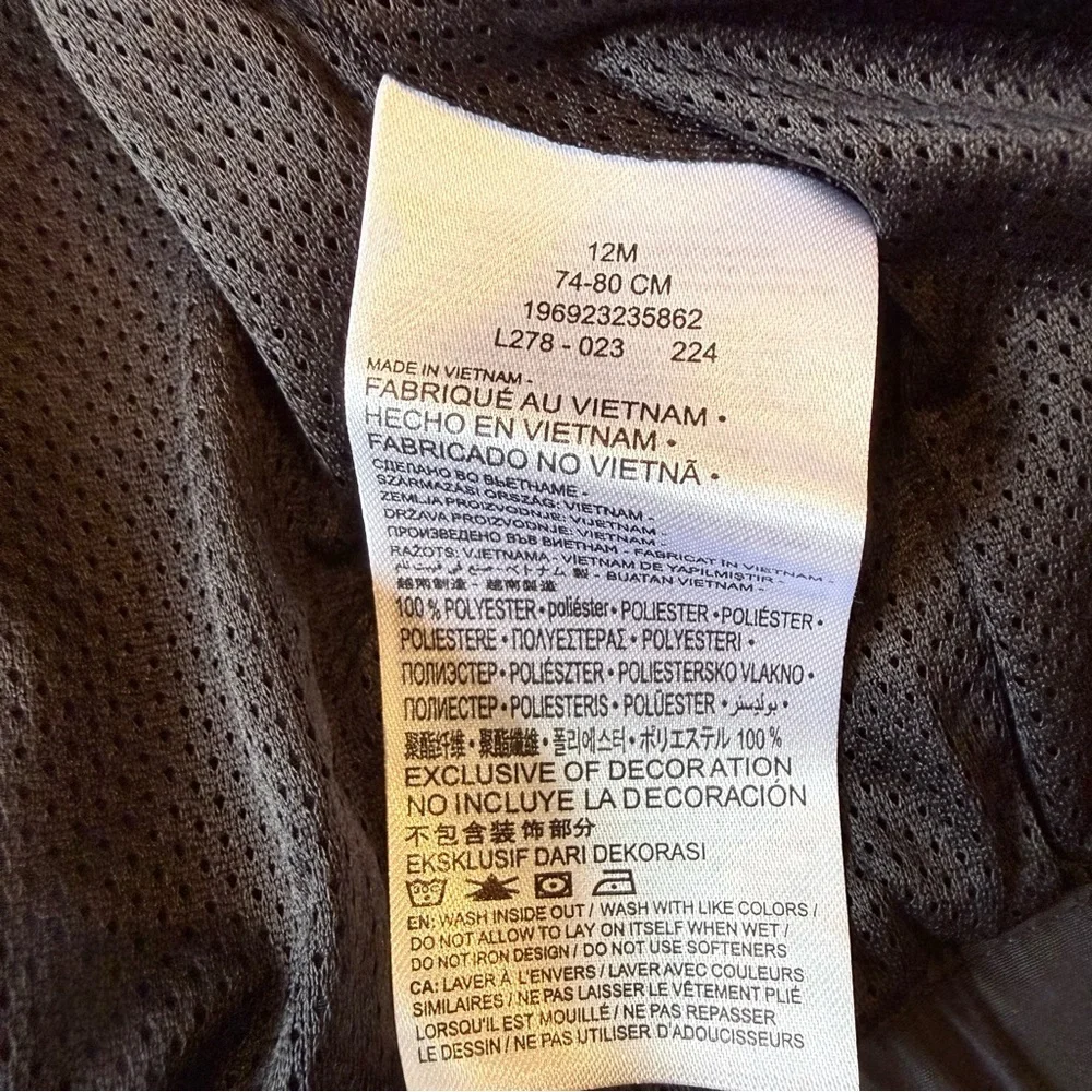 NWT Nike black Windrunner jacket size 12 months